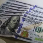 Dólar fecha a R$ 4,95, menor nível em dois anos
